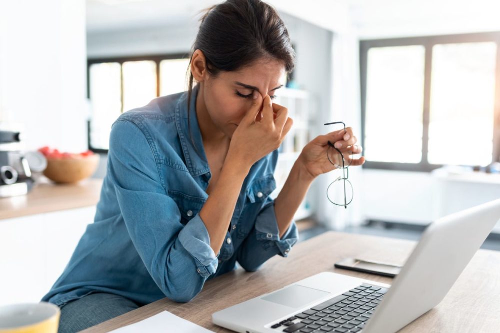 photo: woman experiencing uncertainty in business future